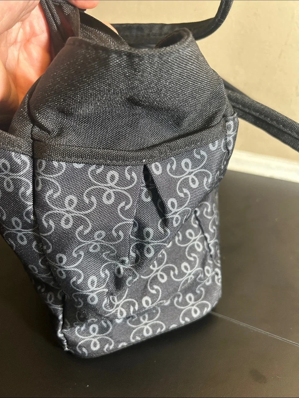 The First Years black and grey patterned canvas diaper bag tote